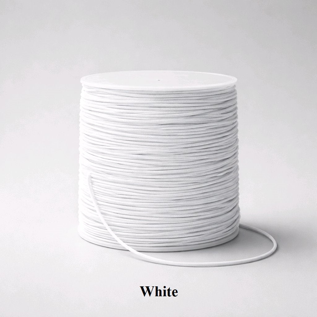 1mm white nylon-covered elastic cord., clean essential for bridal jewelry, pearl restringing, and classic white-beaded designs