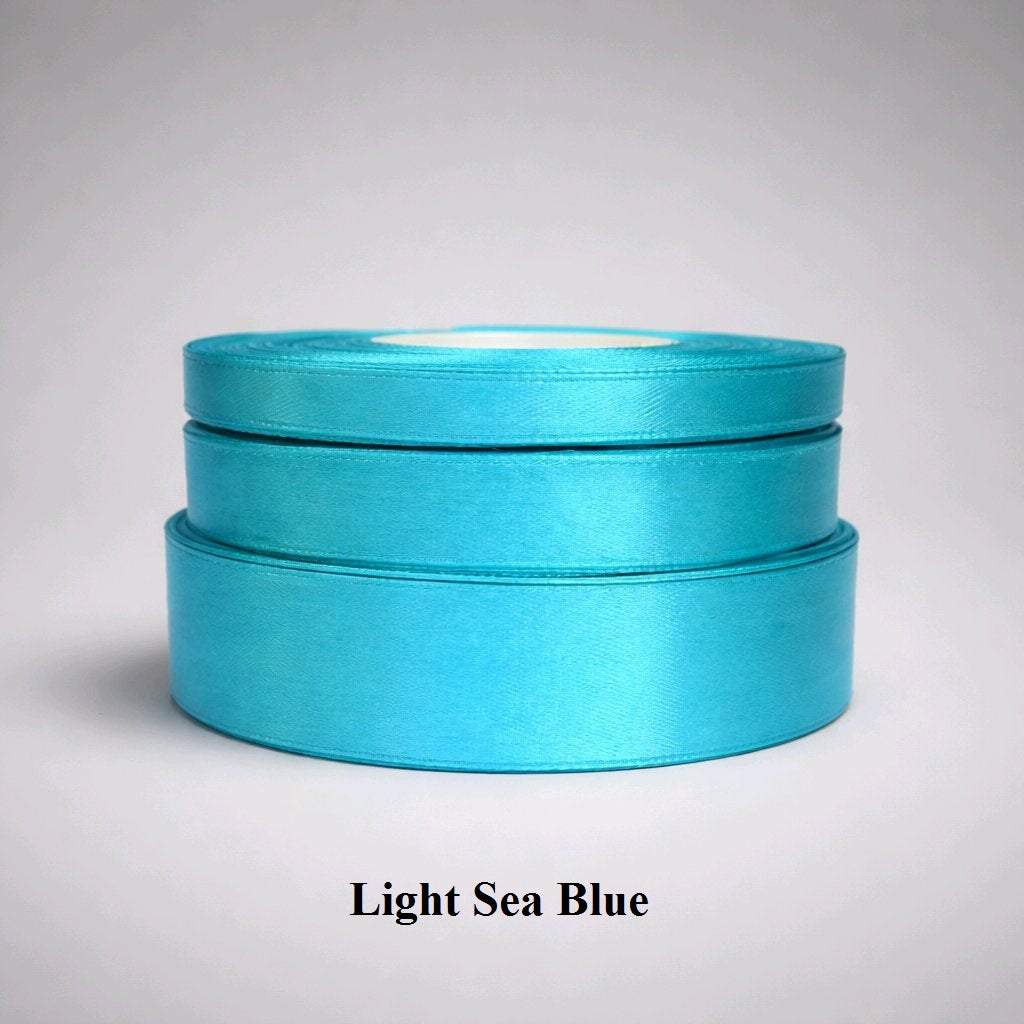 12mm light sea blue satin ribbon; soft aqua-toned polyester for coastal-themed events and summer crafts