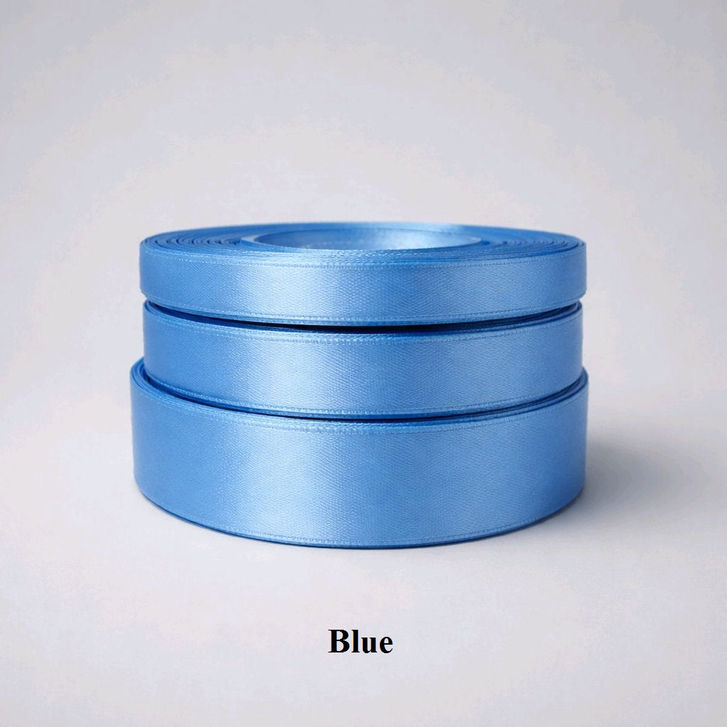 25mm classic blue single-faced satin ribbon; versatile 32m reel for all-purpose gift wrapping and papercraft