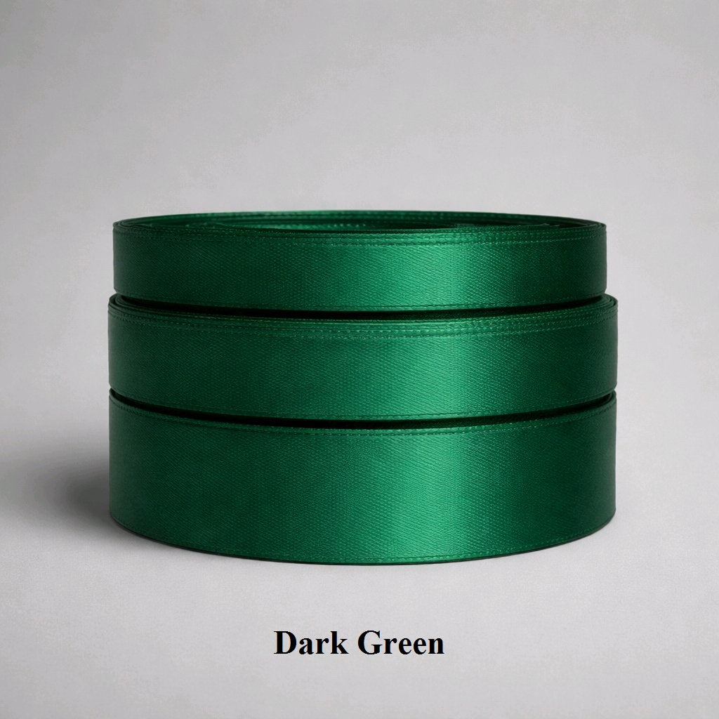 25mm dark green satin ribbon; deep forest-green polyester for elegant winter favours and luxury gift boxes