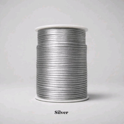 2mm silver rattail cord; cool metallic-grey silky nylon thread for contemporary jewellery and shimmering gift wraps.
