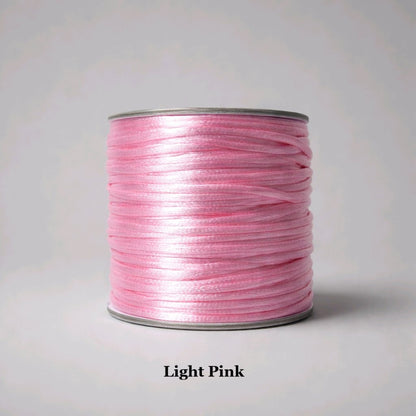 2mm light pink satin cord; delicate baby pink rattail string for nursery favours and soft-touch jewellery designs