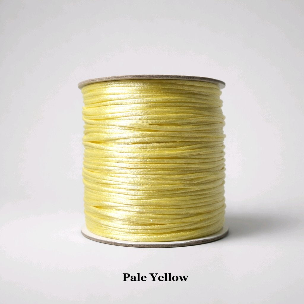 Pale Yellow: 2mm pale yellow rattail satin cord; silky nylon string for spring-themed Shamballa bracelets and decorative floral tassels.