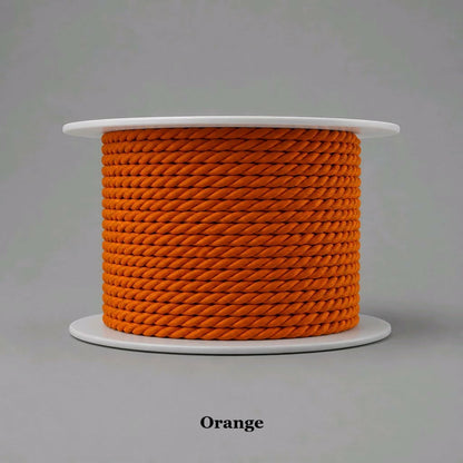 Bright orange 3.5mm twisted cord trim, adding a bold pop of color to custom bags and home accents
