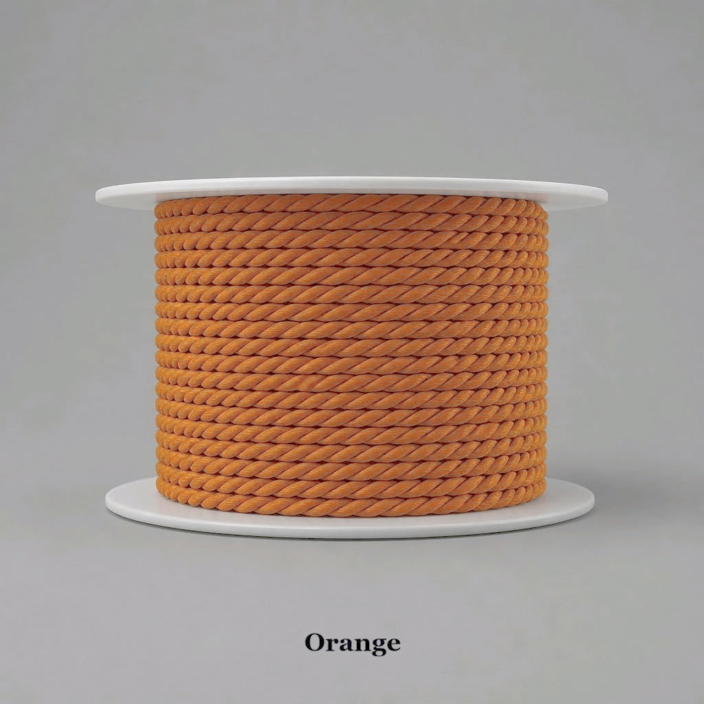orange 3.5mm twisted cord trim, adding a bold pop of color to custom bags and home accents