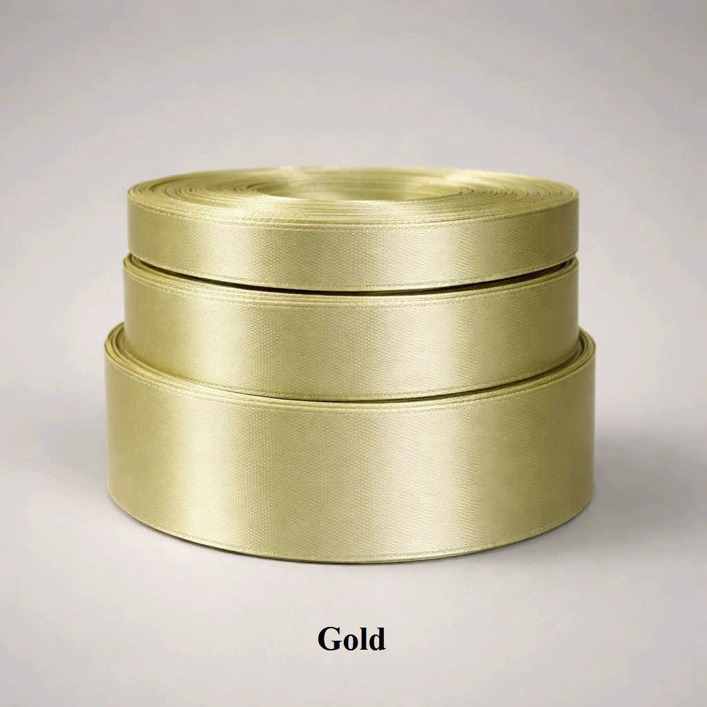 6mm classic gold single-sided satin ribbon; 32m of lustrous trim for luxury packaging and festive holiday decor.