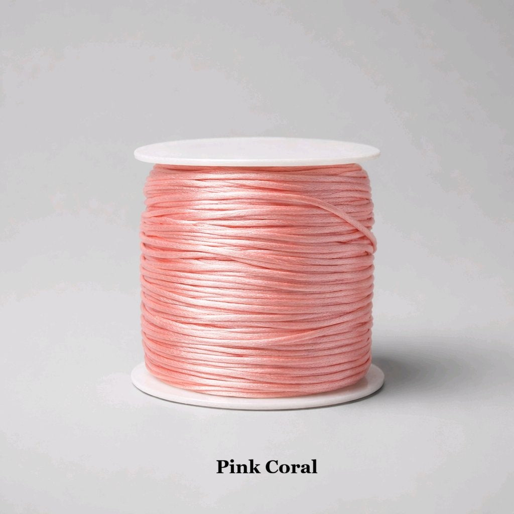 1mm pinky coral rattail satin cord; vibrant warm-pink silky nylon string for summer Shamballa bracelets, tropical-themed Kumihimo braiding, and delicate jewellery tassels.