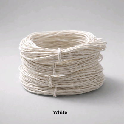 1mm white waxed cotton cord; crisp white polished beading thread for wedding favours, bridal jewellery, and clean macramé.